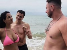 Brunette amateur gets horny on beach - rough threesome with two hot guys